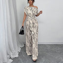 Harper Printed Asymmetric Belted Jumpsuit